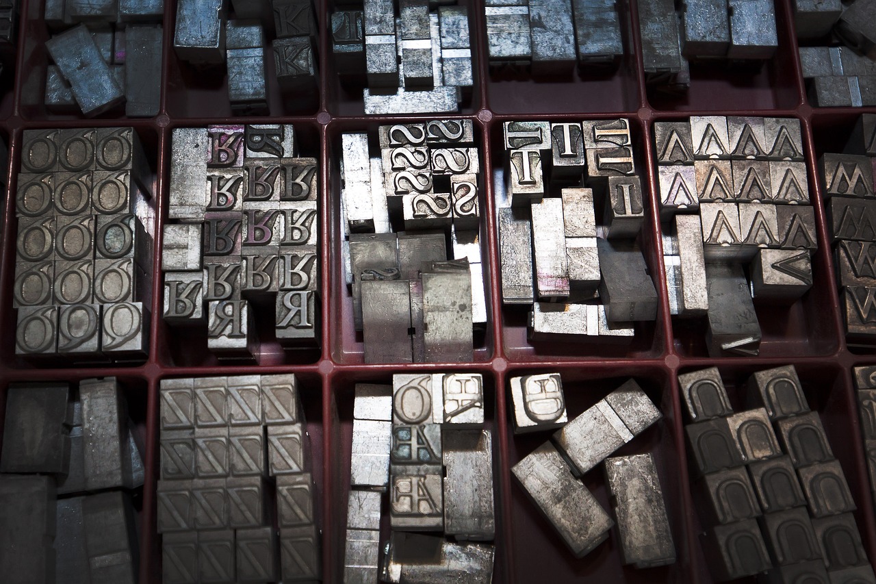 Metal letters used in a printing press to set the typography
